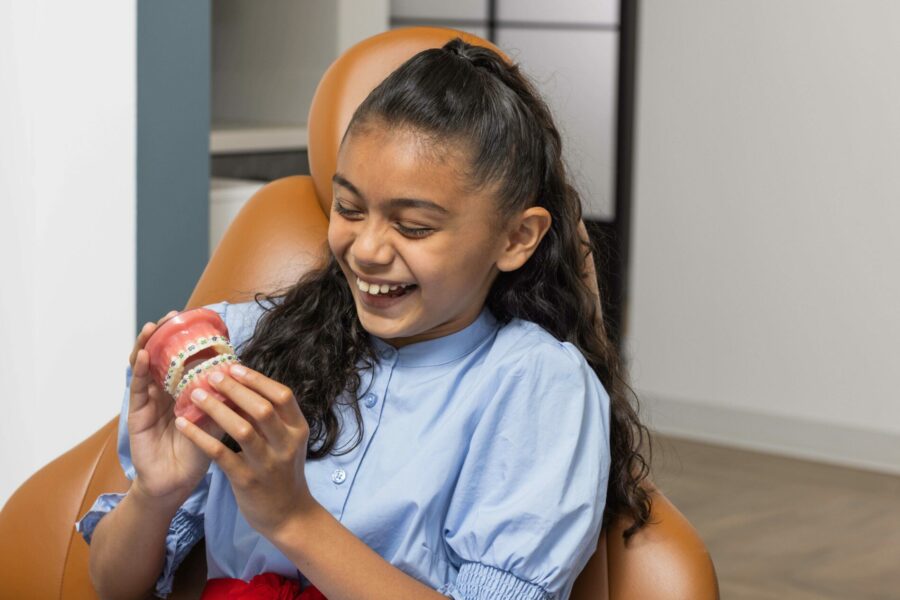 Young Patient Looks at Braces