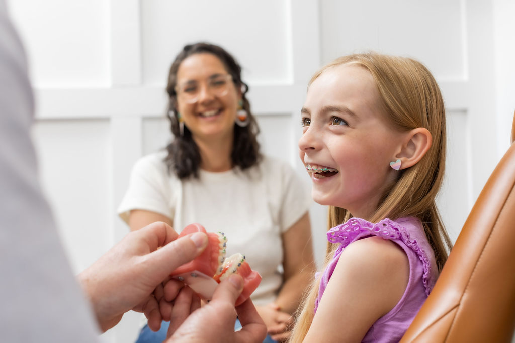 Braces Patient Smiles at Dr. Bates